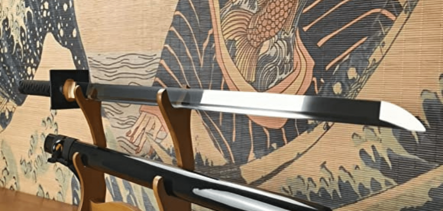 Swords in a display rack in front of a Japanese painting