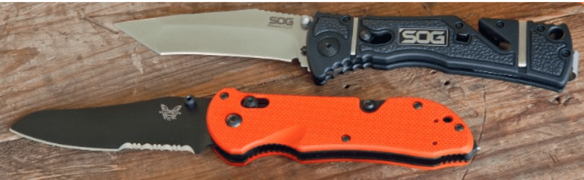 An orange handle Benchmade with black partially serrated blade and a SOG with black handles and a silver Tanto blade