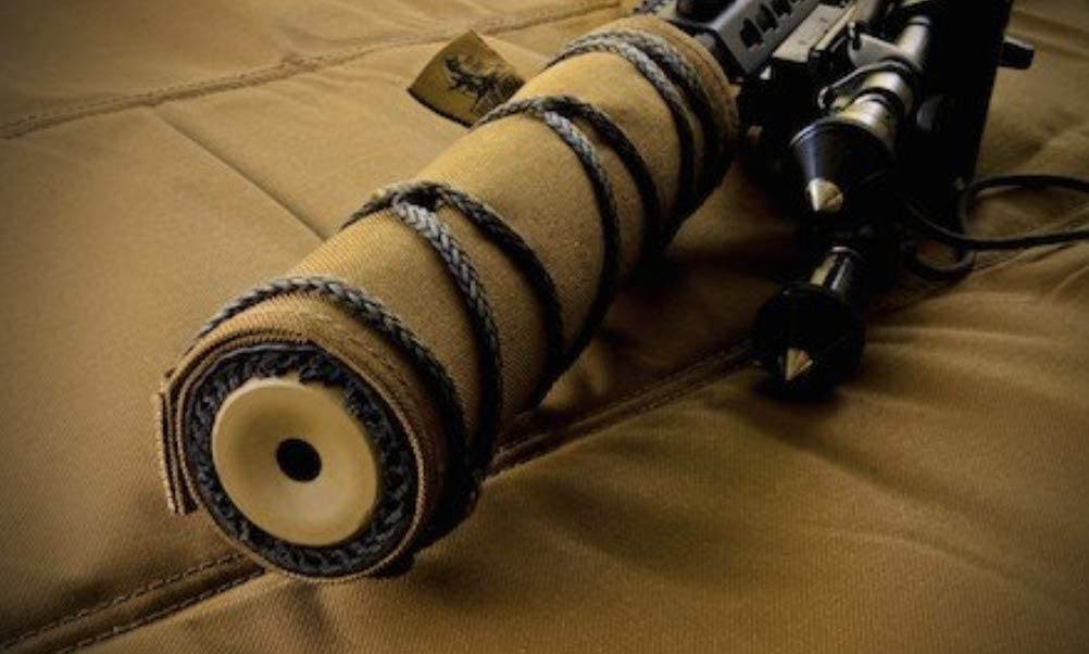 A tan cover on a tan suppressor on a tan range bag