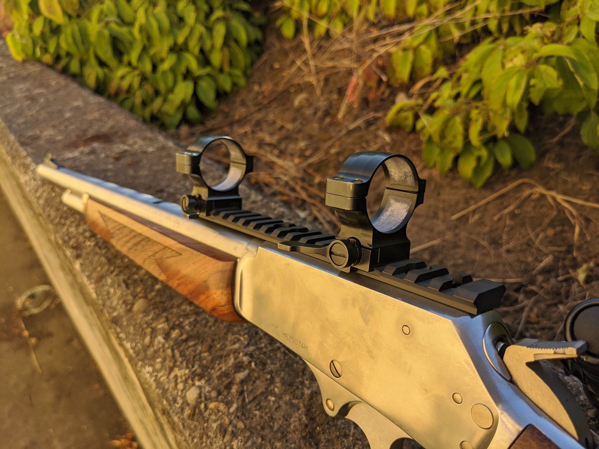 A Marlin 336 sitting on the ground with the XS Sights rail and scope mounts