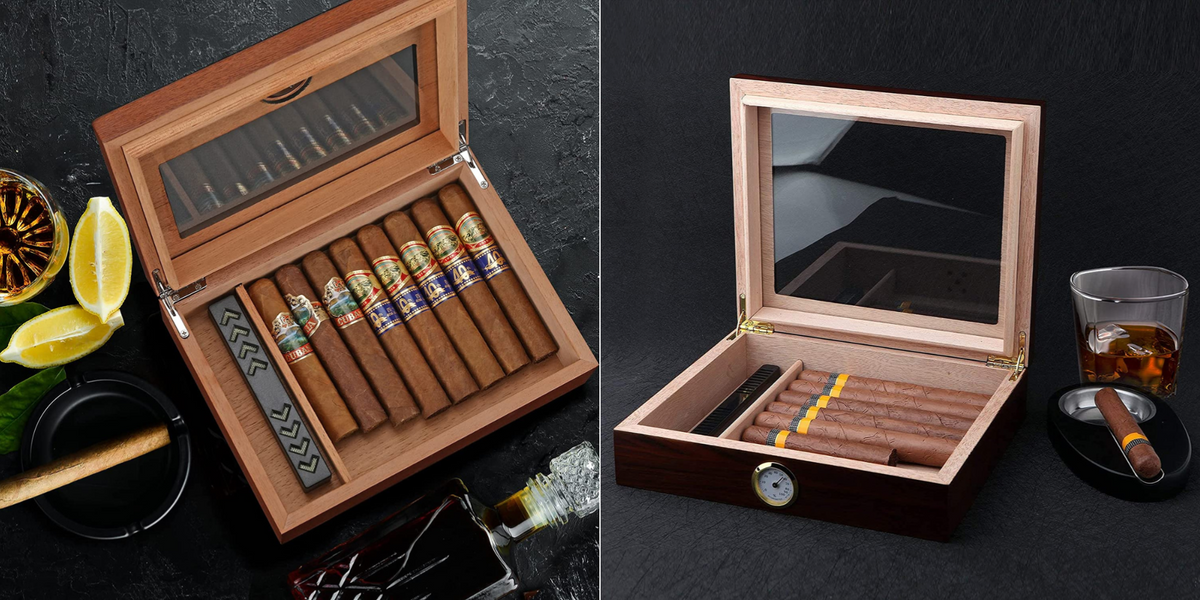 A humidor, full of cigars, setting next to an ashtray and drink.