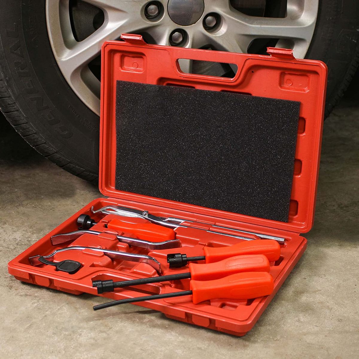 8 piece brake tool kit in a red blow molded case sitting on a beige floor.