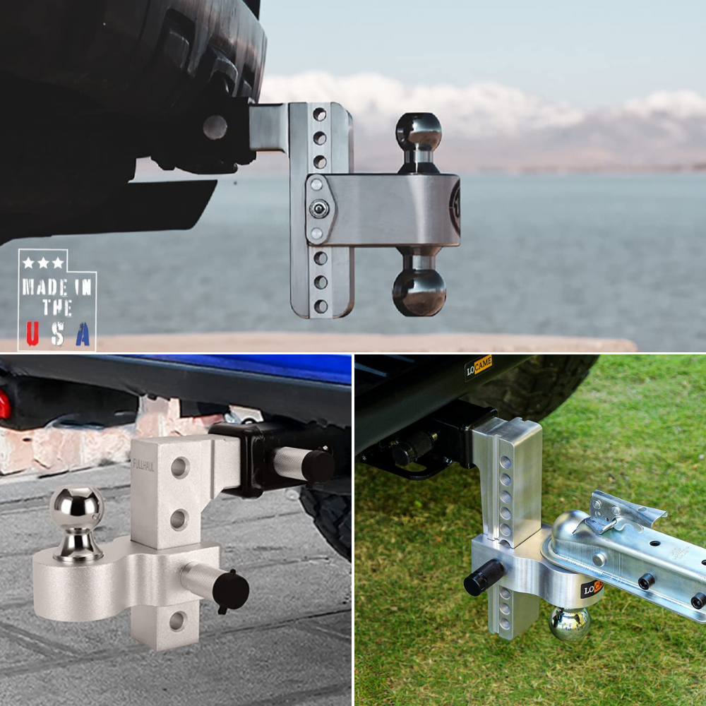 3 adjustable aluminum drop hitches in receivers with 1 being hooked to a trailer