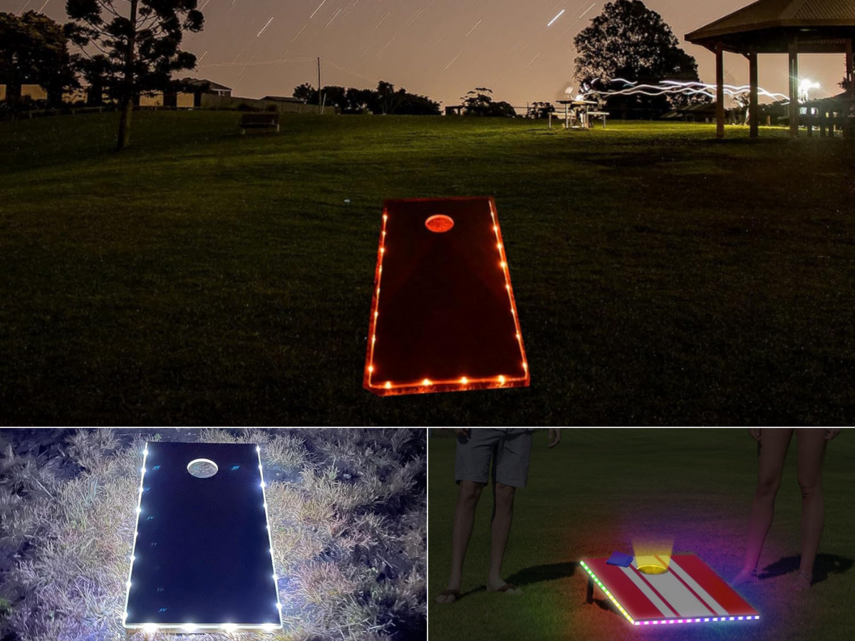 A cornhole board with red lights, another with white lights, and another with multicolor lights.