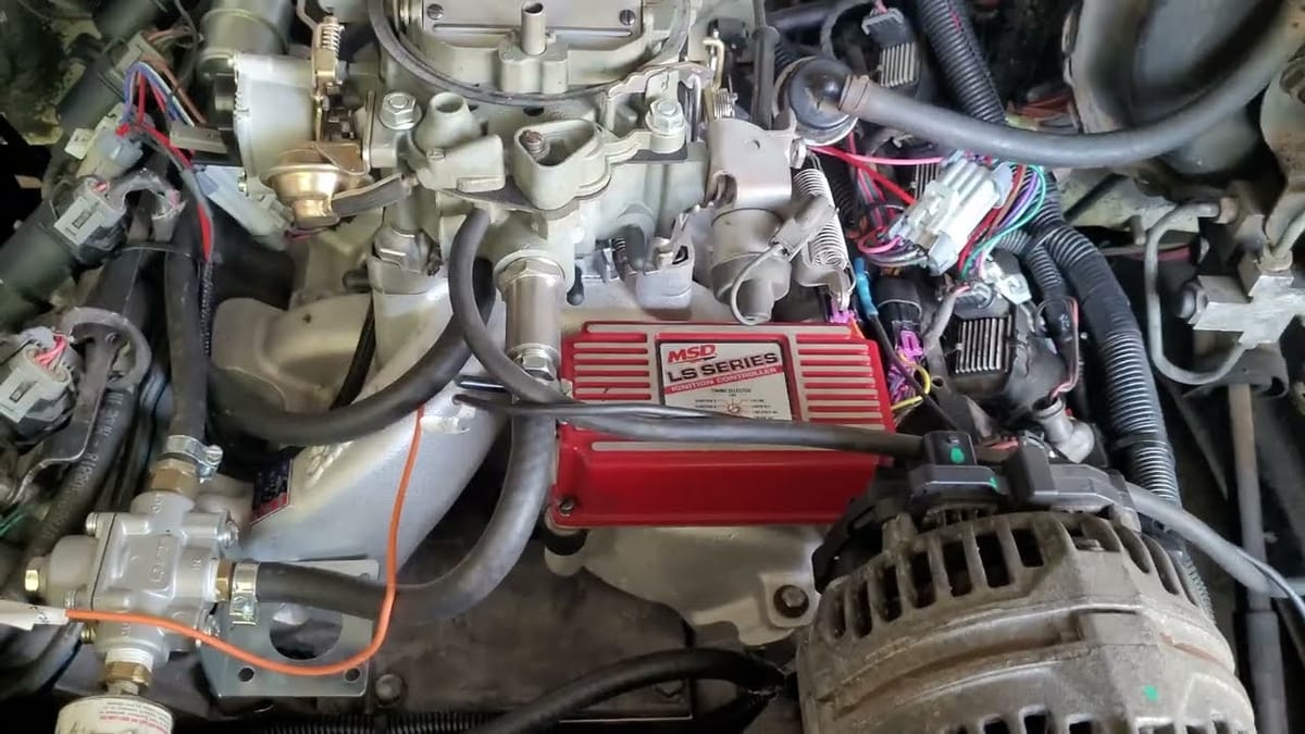 A MSD LS Series ignition box on an engine with a carb.