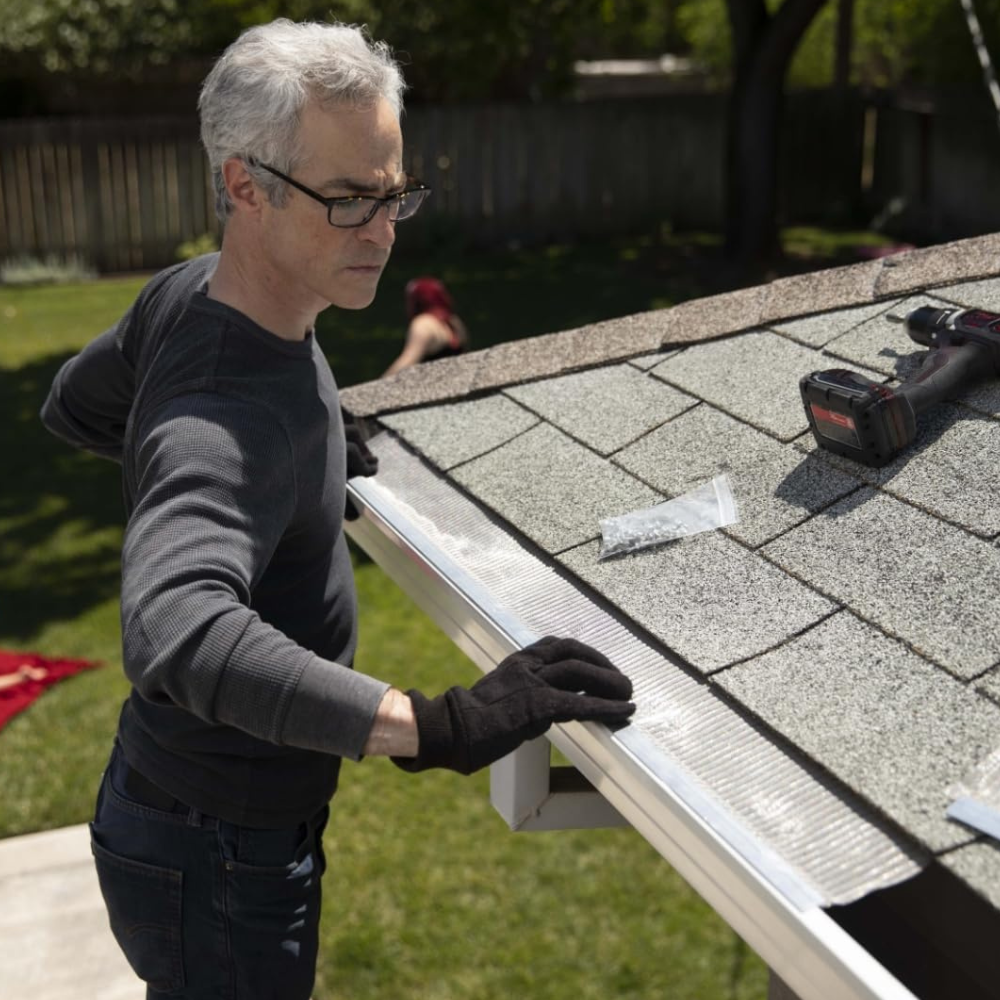 Micro mesh being installed on a gutter system.